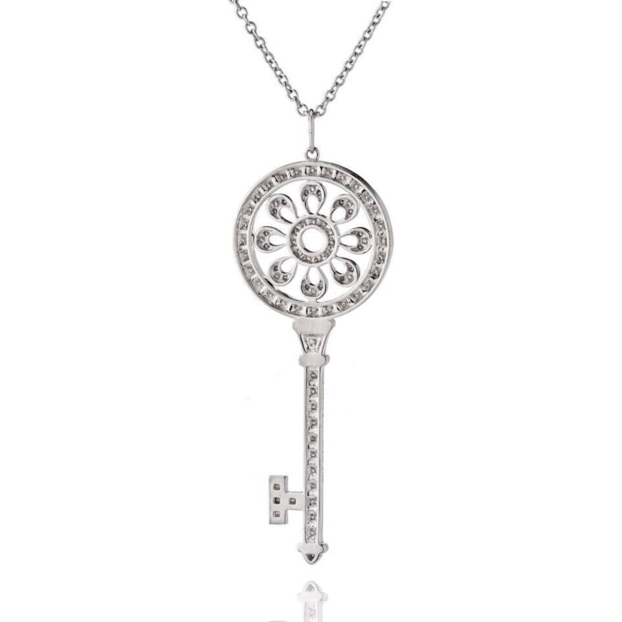 Tiffany & Co. - Platinum Diamond Petals Key Pendant